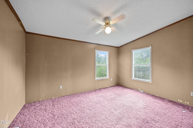 112 Elsie Marie Dr, Youngsville, NC 27596 - unfurnished room featuring a ceiling fan, a textured ceiling, lofted ceiling, crown molding, and carpet floors
