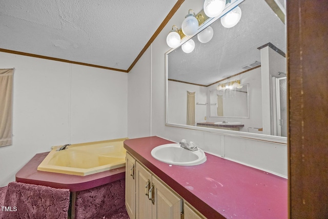 112 Elsie Marie Dr, Youngsville, NC 27596 - bathroom featuring ornamental molding, vanity, a textured ceiling, and a bath