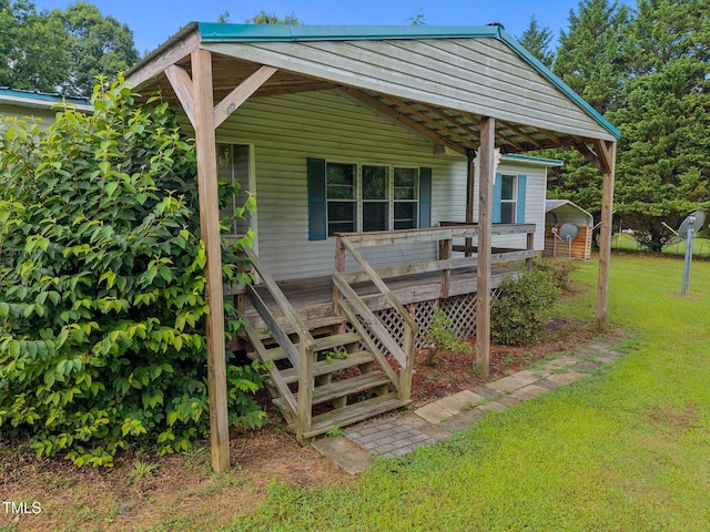 112 Elsie Marie Dr, Youngsville, NC 27596 - view of front of house with a front yard, a deck, and stairway