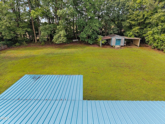 112 Elsie Marie Dr, Youngsville, NC 27596 - view of green lawn with view of scattered trees
