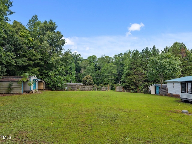 112 Elsie Marie Dr, Youngsville, NC 27596 - view of yard featuring a shed