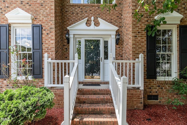 801 Falling Wind Ct, Raleigh, NC 27610 - doorway to property with brick siding and crawl space