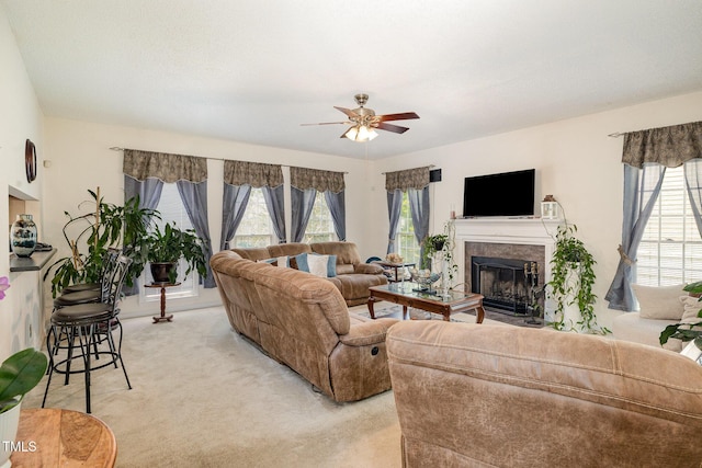 801 Falling Wind Ct, Raleigh, NC 27610 - living area featuring a ceiling fan, light carpet, and a fireplace with flush hearth