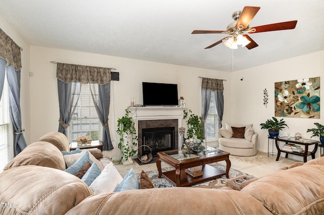 801 Falling Wind Ct, Raleigh, NC 27610 - living area featuring ceiling fan and a fireplace with flush hearth