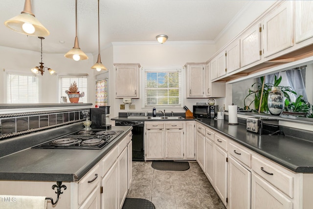 801 Falling Wind Ct, Raleigh, NC 27610 - kitchen with black appliances, dark countertops, crown molding, hanging light fixtures, and a chandelier