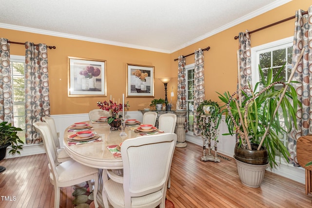 801 Falling Wind Ct, Raleigh, NC 27610 - dining room with light wood-type flooring and crown molding