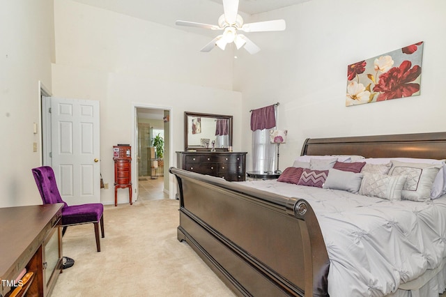 801 Falling Wind Ct, Raleigh, NC 27610 - bedroom featuring light carpet, a high ceiling, ensuite bath, and a ceiling fan