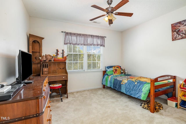 801 Falling Wind Ct, Raleigh, NC 27610 - bedroom featuring light carpet, an office area, and a ceiling fan