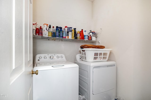 801 Falling Wind Ct, Raleigh, NC 27610 - laundry area with washer and clothes dryer