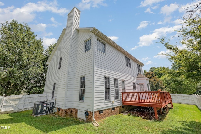 801 Falling Wind Ct, Raleigh, NC 27610 - rear view of house with a wooden deck, crawl space, a fenced backyard, and a chimney