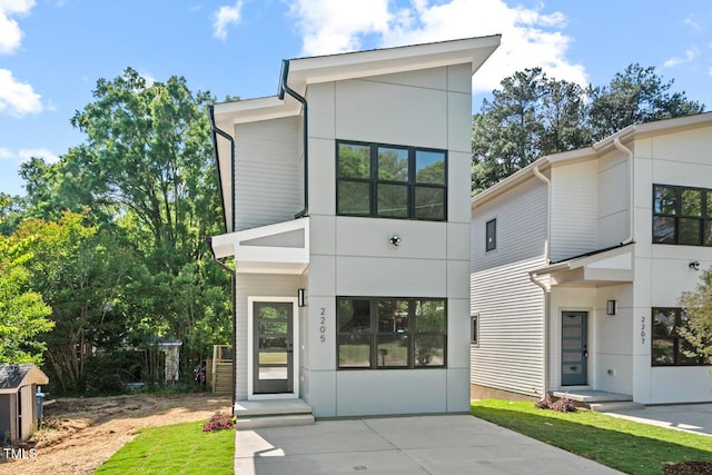 2205 Tampa Ave, Durham, NC 27705 - modern home featuring stucco siding
