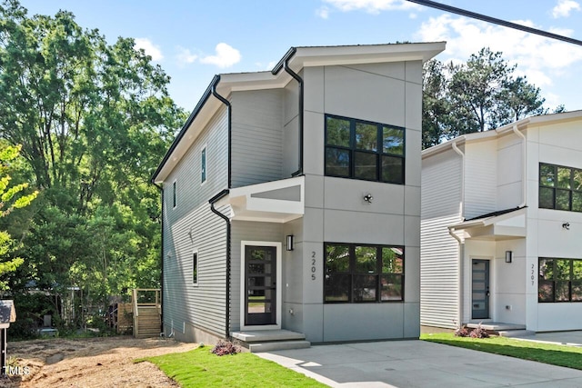 2205 Tampa Ave, Durham, NC 27705 - modern home featuring stucco siding