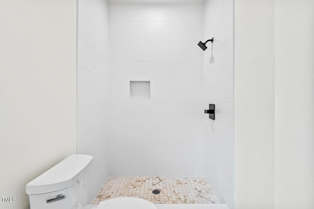 2205 Tampa Ave, Durham, NC 27705 - bathroom featuring tiled shower and toilet
