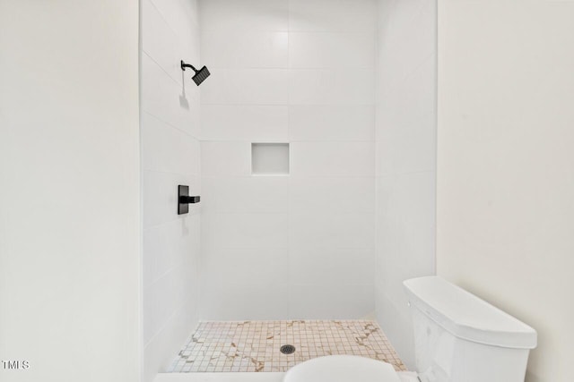 2205 Tampa Ave, Durham, NC 27705 - bathroom featuring a stall shower and toilet