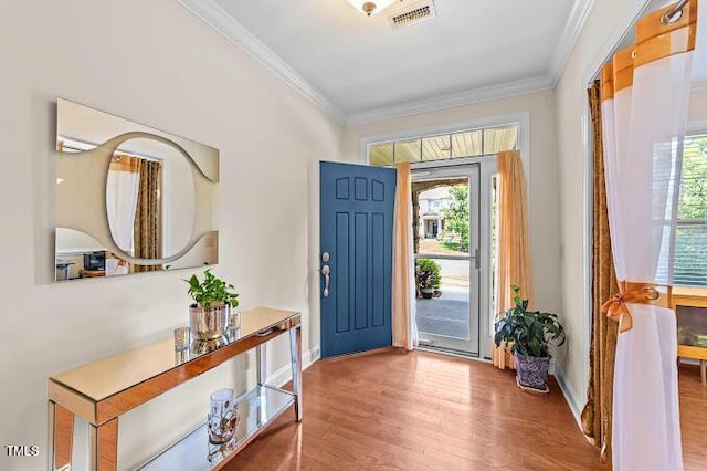 4007 Strendal Dr, Cary, NC 27519 - entrance foyer with crown molding and wood finished floors