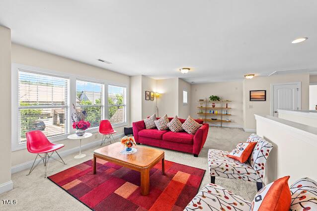 4007 Strendal Dr, Cary, NC 27519 - living area featuring carpet flooring and baseboards