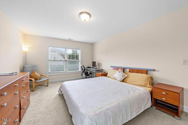 4007 Strendal Dr, Cary, NC 27519 - bedroom with light colored carpet