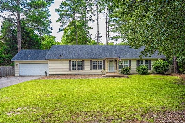 1360 Rays Bridge Rd, Whispering Pines, NC 28327 - single story home with concrete driveway and an attached garage