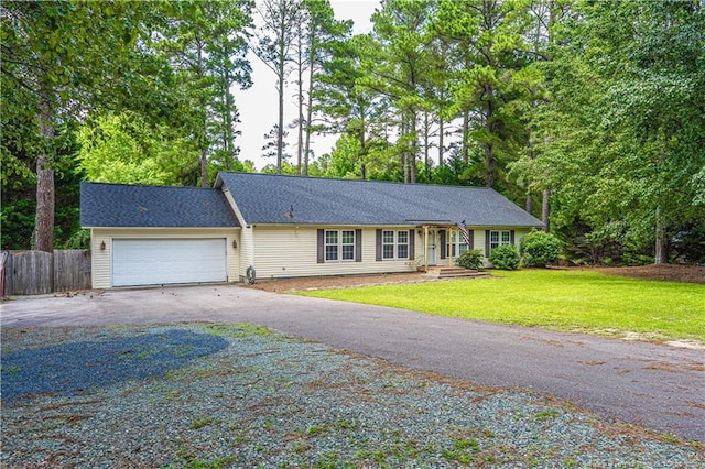 1360 Rays Bridge Rd, Whispering Pines, NC 28327 - ranch-style house featuring driveway and a garage