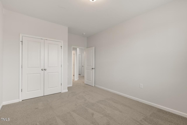 1409 Jasmine View Way, Knightdale, NC 27545 - unfurnished bedroom featuring carpet floors and a closet