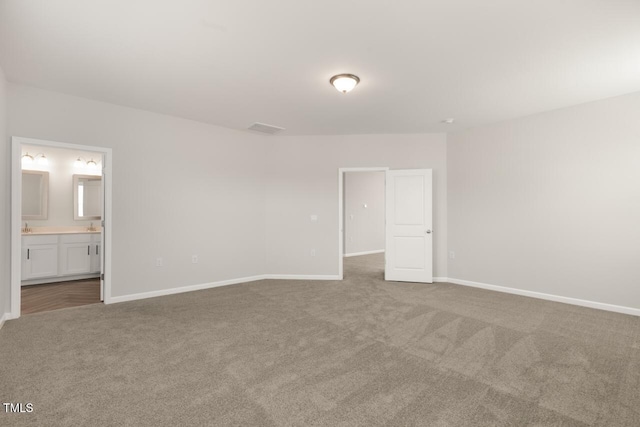 1409 Jasmine View Way, Knightdale, NC 27545 - unfurnished bedroom featuring carpet flooring and connected bathroom