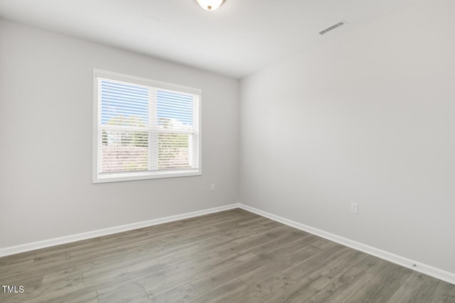 1409 Jasmine View Way, Knightdale, NC 27545 - spare room featuring wood finished floors and baseboards