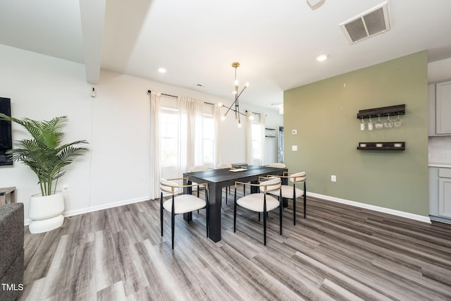 1143 Sweet Cream Ct, Durham, NC 27703 - dining area featuring wood finished floors, recessed lighting, and a chandelier