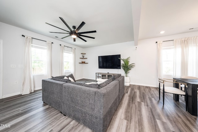 1143 Sweet Cream Ct, Durham, NC 27703 - living room with wood finished floors, ceiling fan, and recessed lighting