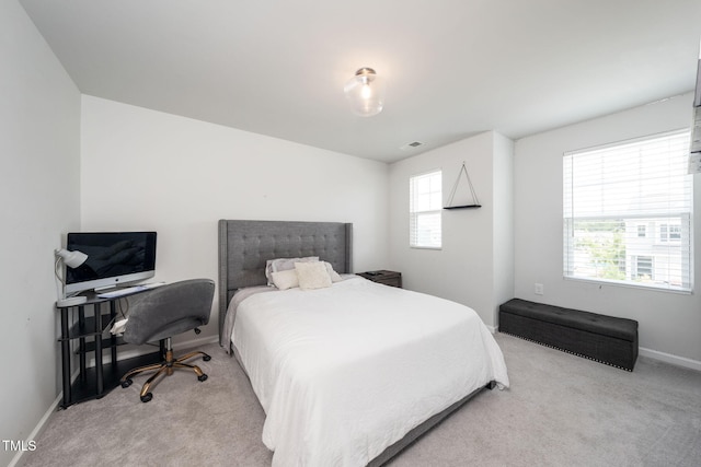 1143 Sweet Cream Ct, Durham, NC 27703 - bedroom with light carpet and baseboards