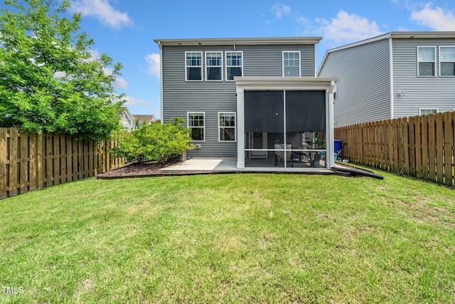 1143 Sweet Cream Ct, Durham, NC 27703 - back of property featuring a sunroom, a fenced backyard, and a patio