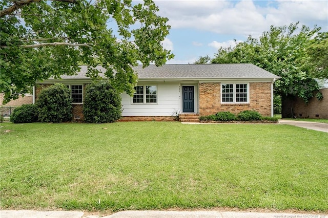 4450 Chesterbrook Dr, Fayetteville, NC 28314 - single story home with a front lawn, brick siding, and entry steps