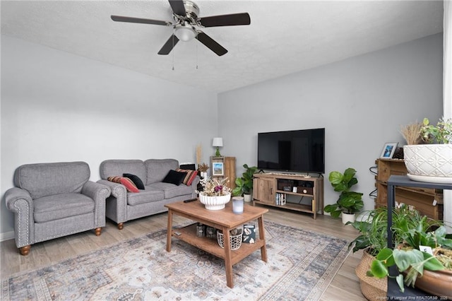 4450 Chesterbrook Dr, Fayetteville, NC 28314 - living room with wood finished floors and a ceiling fan