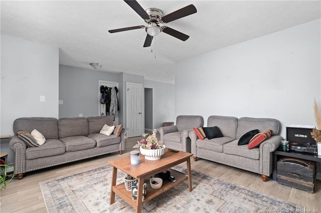 4450 Chesterbrook Dr, Fayetteville, NC 28314 - living room featuring wood finished floors and a ceiling fan