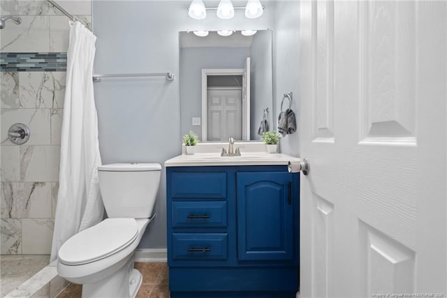 4450 Chesterbrook Dr, Fayetteville, NC 28314 - full bathroom featuring vanity, a tile shower, and tile patterned flooring
