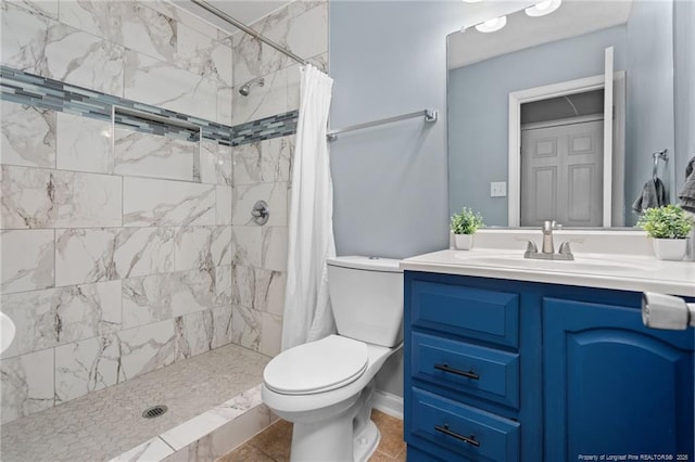4450 Chesterbrook Dr, Fayetteville, NC 28314 - full bathroom featuring vanity, a tile shower, and tile patterned floors