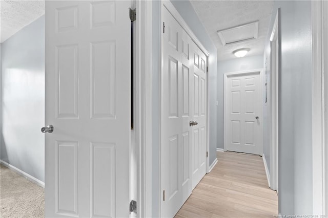 4450 Chesterbrook Dr, Fayetteville, NC 28314 - hallway featuring a textured ceiling and light wood finished floors