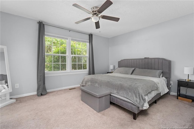 4450 Chesterbrook Dr, Fayetteville, NC 28314 - carpeted bedroom featuring a textured ceiling and ceiling fan