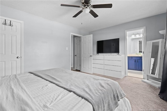4450 Chesterbrook Dr, Fayetteville, NC 28314 - bedroom with light carpet, a textured ceiling, ensuite bath, and ceiling fan