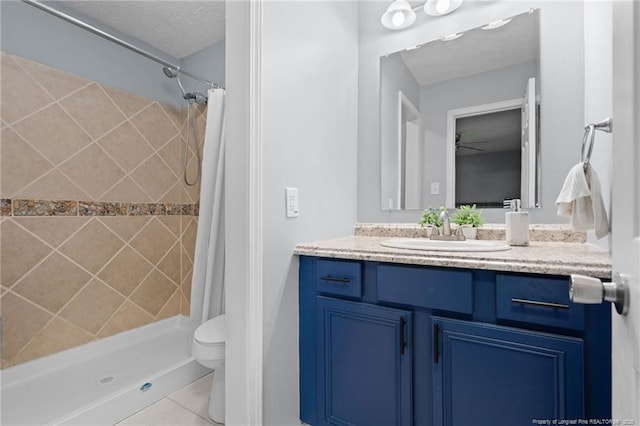 4450 Chesterbrook Dr, Fayetteville, NC 28314 - full bath featuring vanity, a tile shower, and tile patterned floors