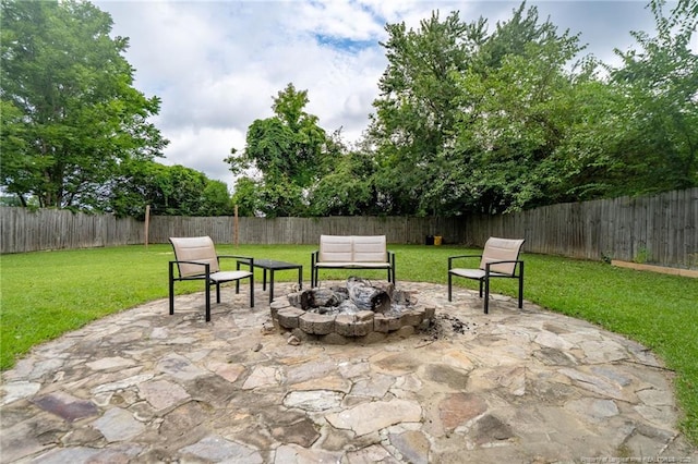 4450 Chesterbrook Dr, Fayetteville, NC 28314 - fenced backyard with a patio area and an outdoor fire pit