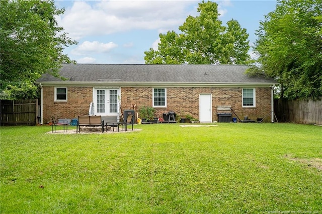 4450 Chesterbrook Dr, Fayetteville, NC 28314 - back of house featuring french doors, a fenced backyard, brick siding, and a patio