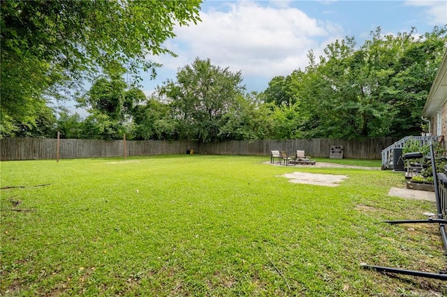 4450 Chesterbrook Dr, Fayetteville, NC 28314 - fenced backyard featuring a patio area
