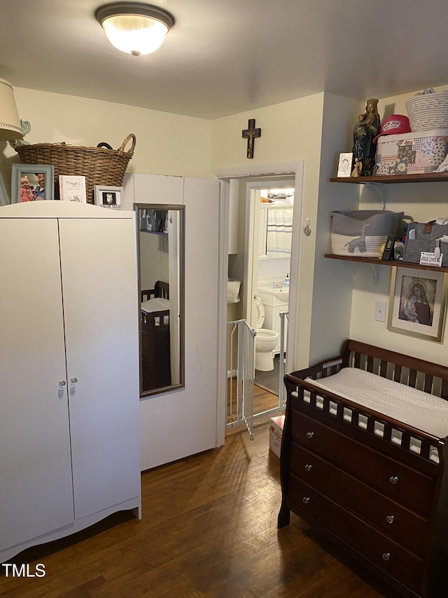 232 Fairview Rd, Cary, NC 27511 - bedroom with wood finished floors and ensuite bath