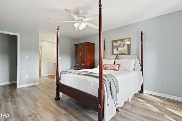 720 Springfork Dr, Cary, NC 27513 - bedroom featuring light wood-style floors and a ceiling fan