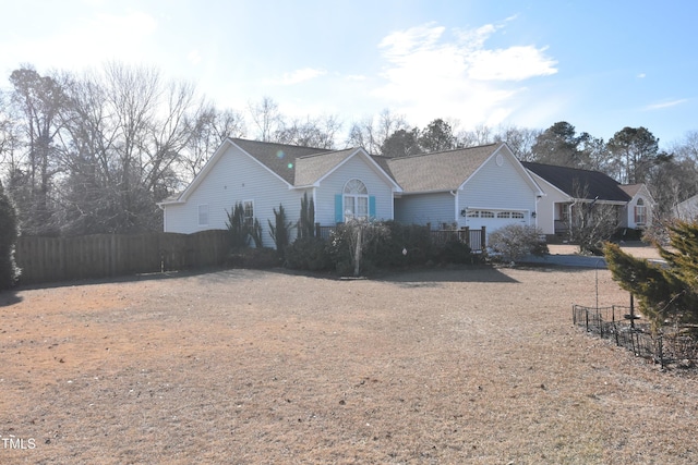216 Parrish Farm Ln, Benson, NC 27504 - ranch-style house with a garage