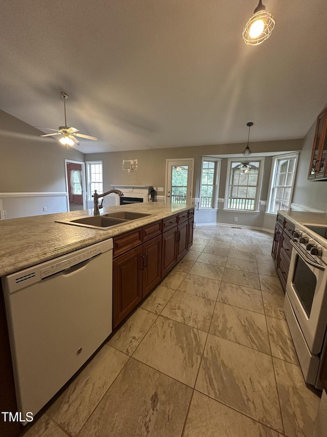 216 Parrish Farm Ln, Benson, NC 27504 - kitchen featuring white appliances, a ceiling fan, light countertops, and pendant lighting