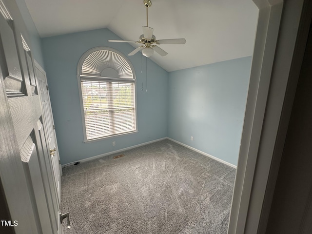 216 Parrish Farm Ln, Benson, NC 27504 - spare room featuring lofted ceiling, a ceiling fan, and carpet