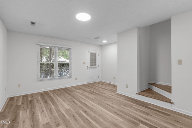 82 Forest Oaks Dr, Durham, NC 27705 - unfurnished room featuring light wood-style floors and recessed lighting