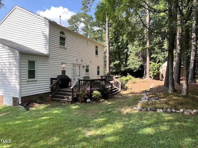 106 Carmel Woods Ct, Wake Forest, NC 27587 - rear view of house featuring a deck, a yard, and a storage shed