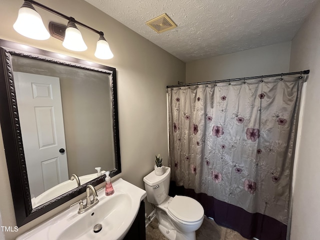 106 Carmel Woods Ct, Wake Forest, NC 27587 - bathroom featuring vanity, a textured ceiling, and a shower with curtain